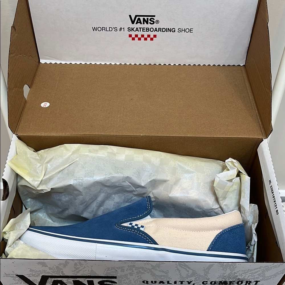 Vans Classic Blue and White Slip-Ons
